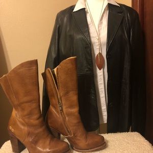 Studio Y, leather jacket with blue satin lining.